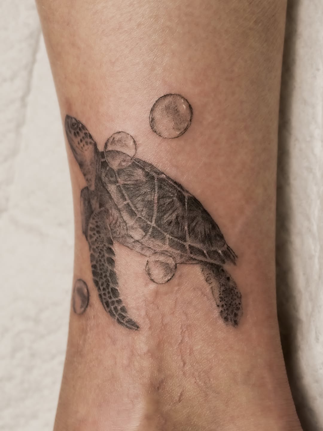 Tattoo by @lunatik_ttt — realism, black_and_grey