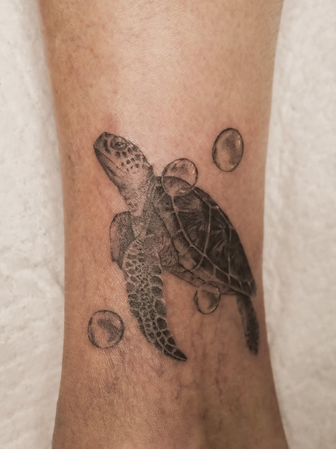 Tattoo by @lunatik_ttt — realism, black_and_grey