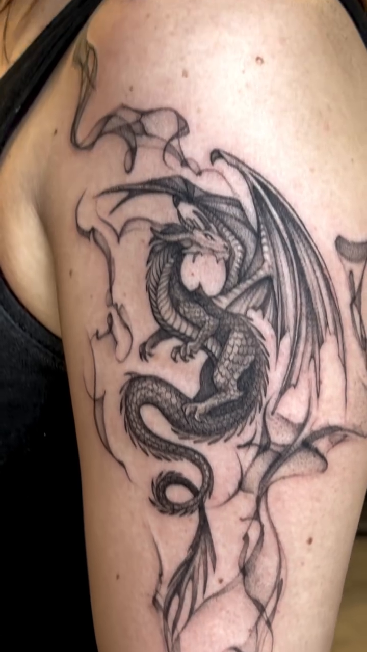 Tattoo by @er.ink.a — black_and_grey, dark_realism