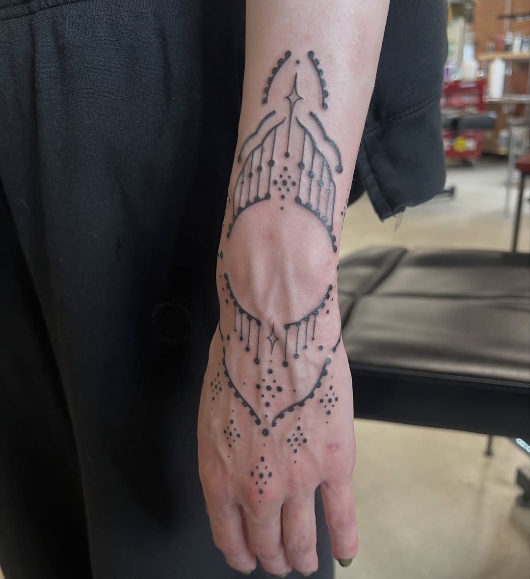 Tattoo by @libbytattoo — geometric, dotwork