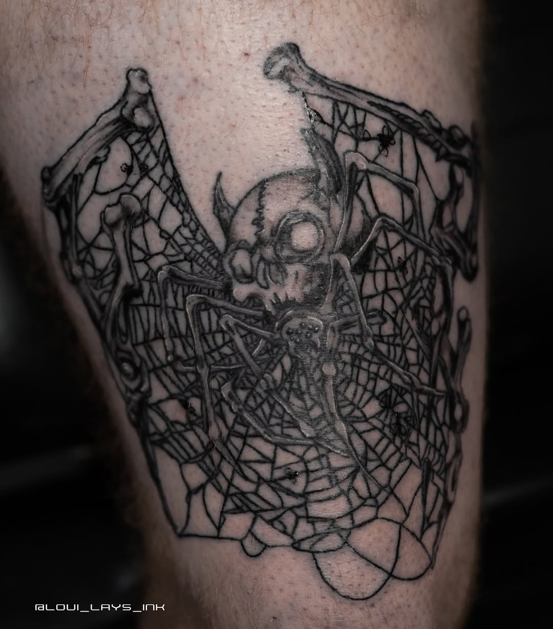 Tattoo by @loui_lays_ink — black_and_grey, dark_realism