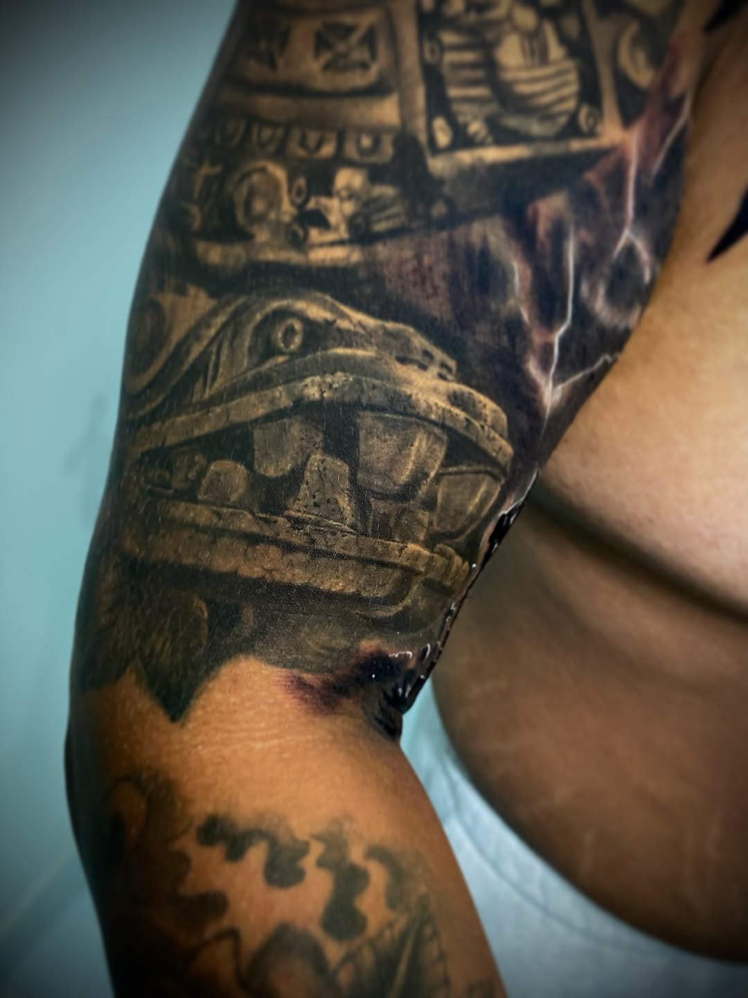 Tattoo by @aifos_arts94 — realism, black_and_grey