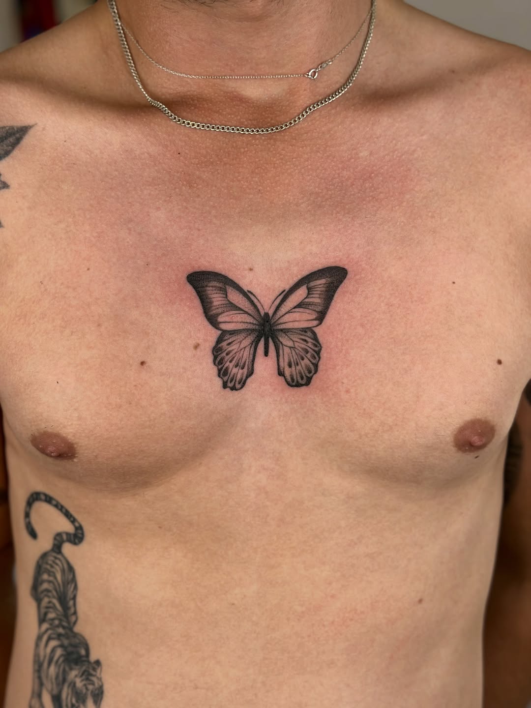 Tattoo by @er.ink.a — black_and_grey, realism