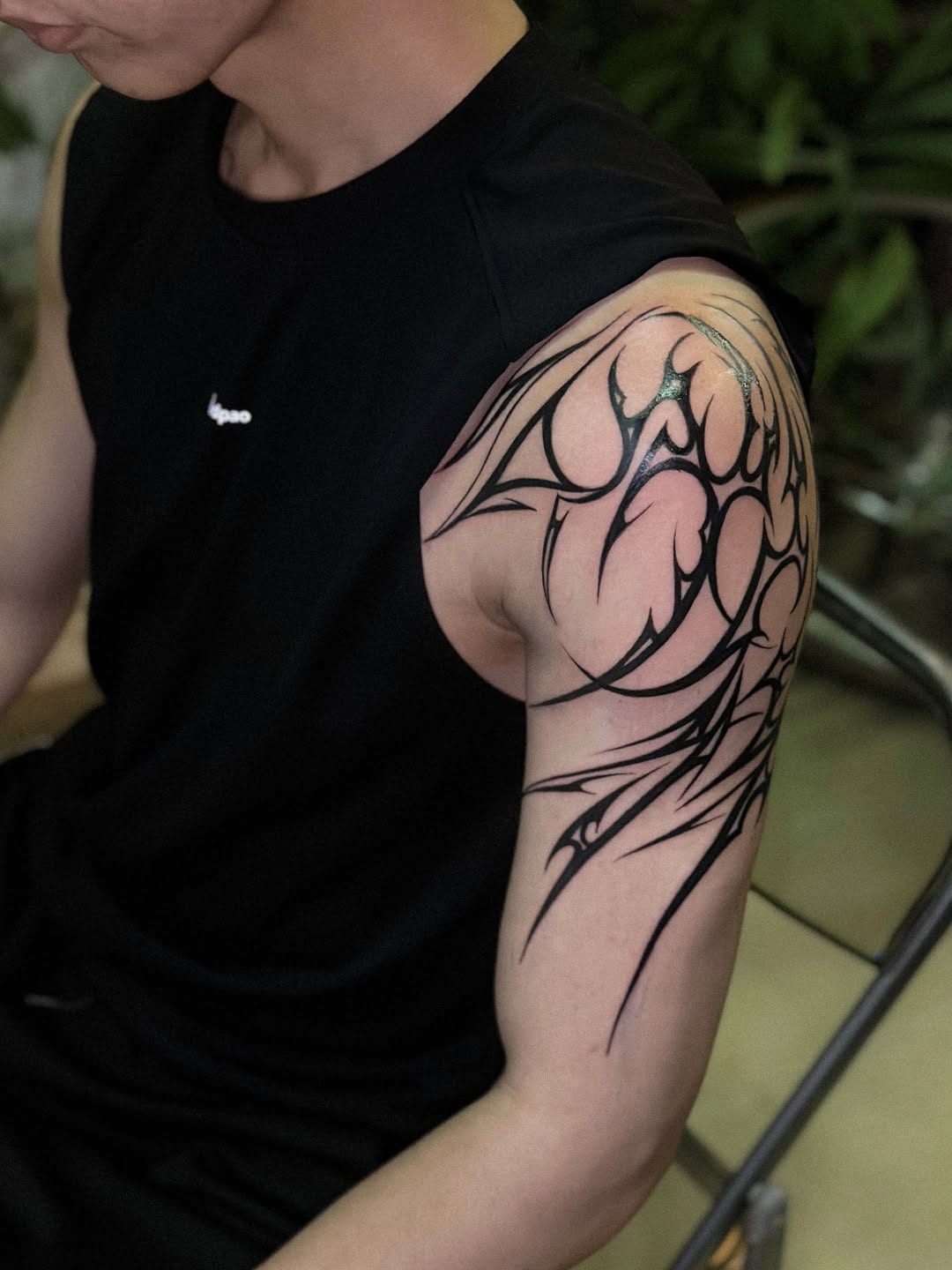 Tattoo by @noir_ink.tattookorat — tribal