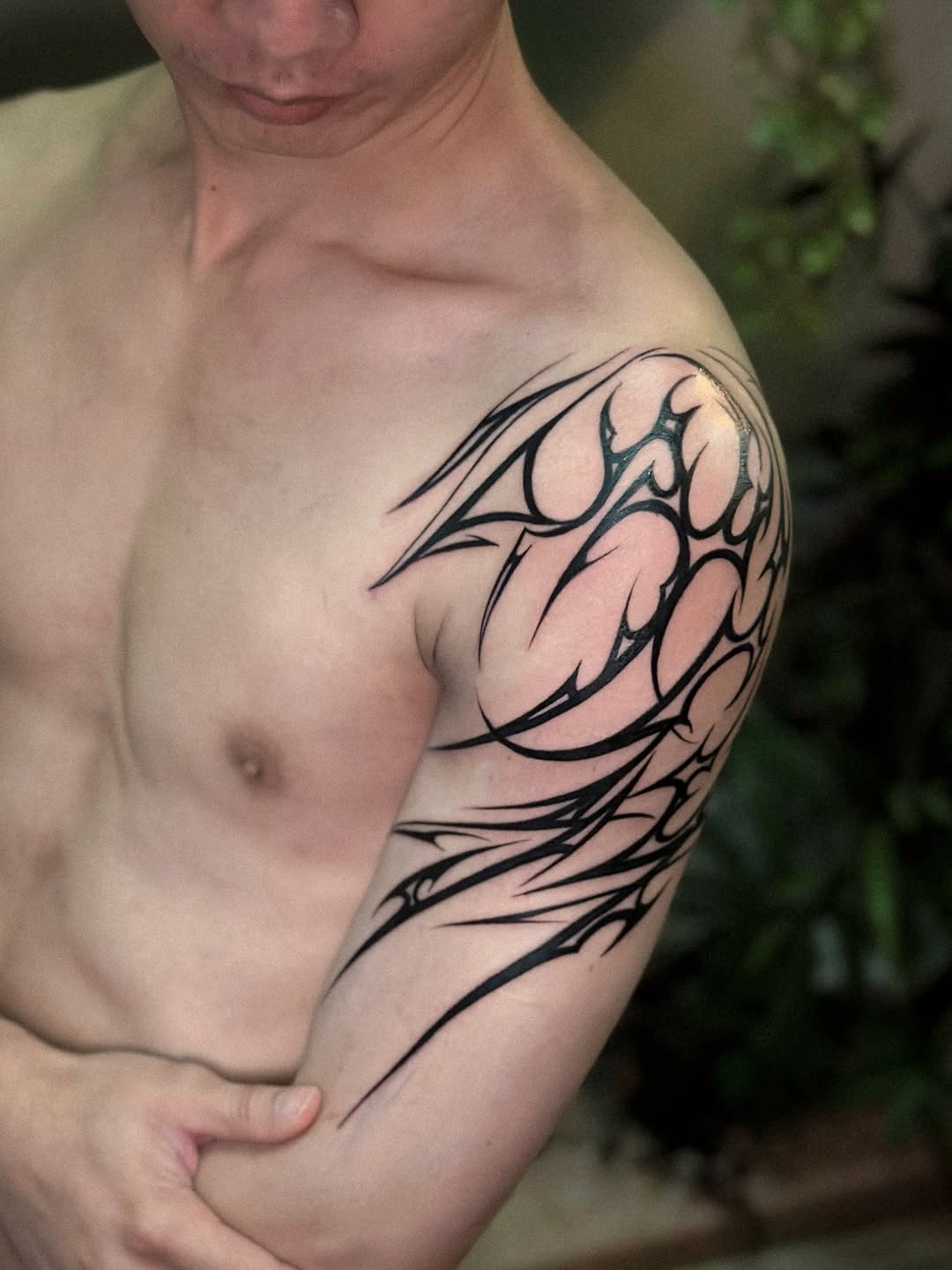 Tattoo by @noir_ink.tattookorat — tribal