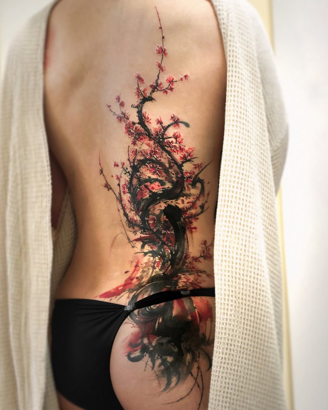 Tattoo by @ati.ful — watercolor, blackwork