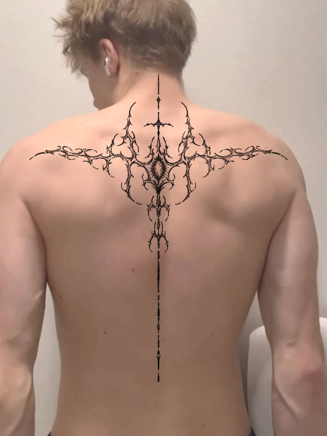 Tattoo by @tiimy.tt — blackwork, geometric