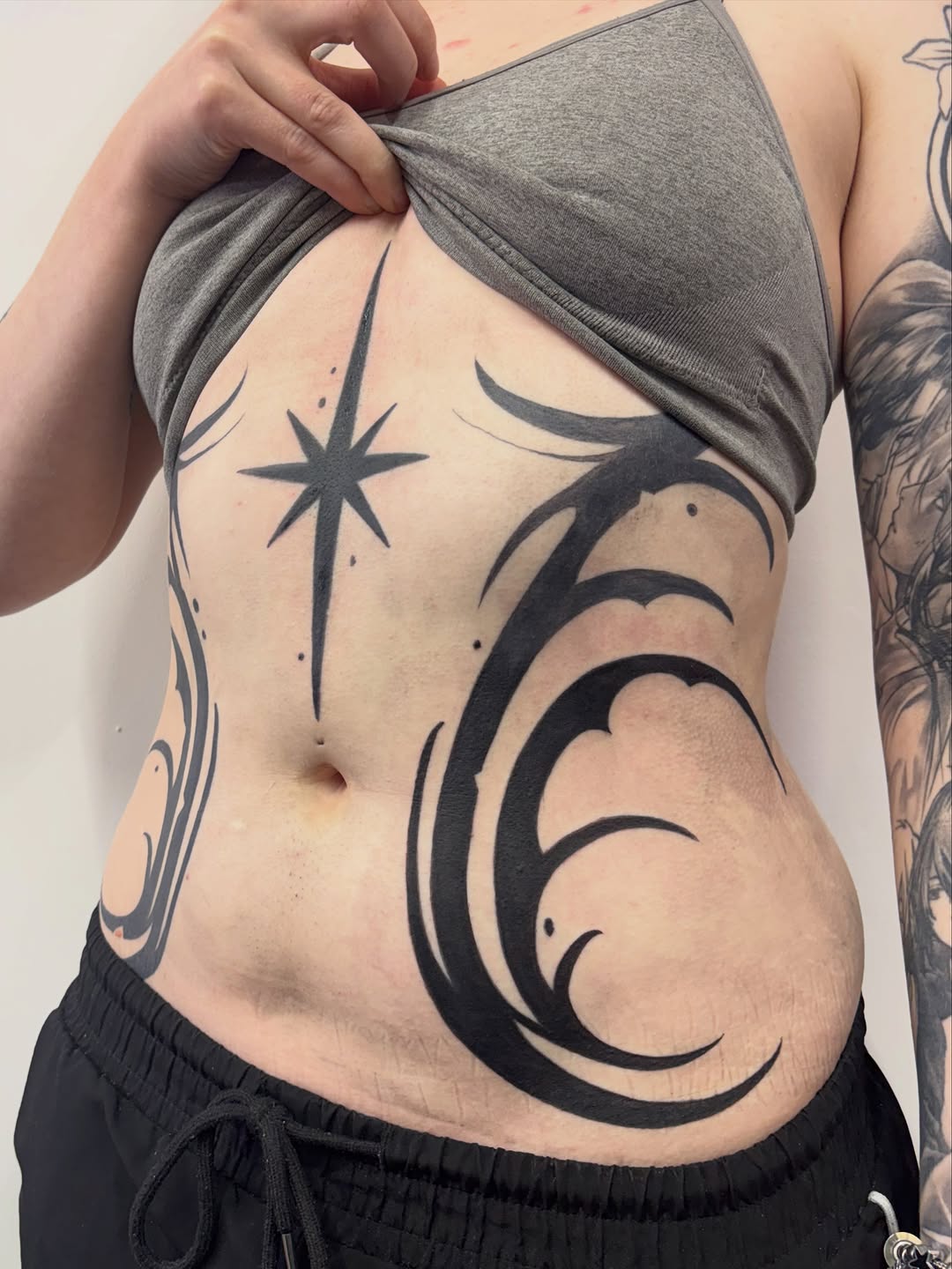Tattoo by @osichristattoos — blackwork