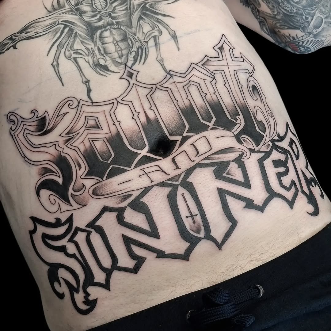 Tattoo by @powetattoos — lettering_script, blackwork