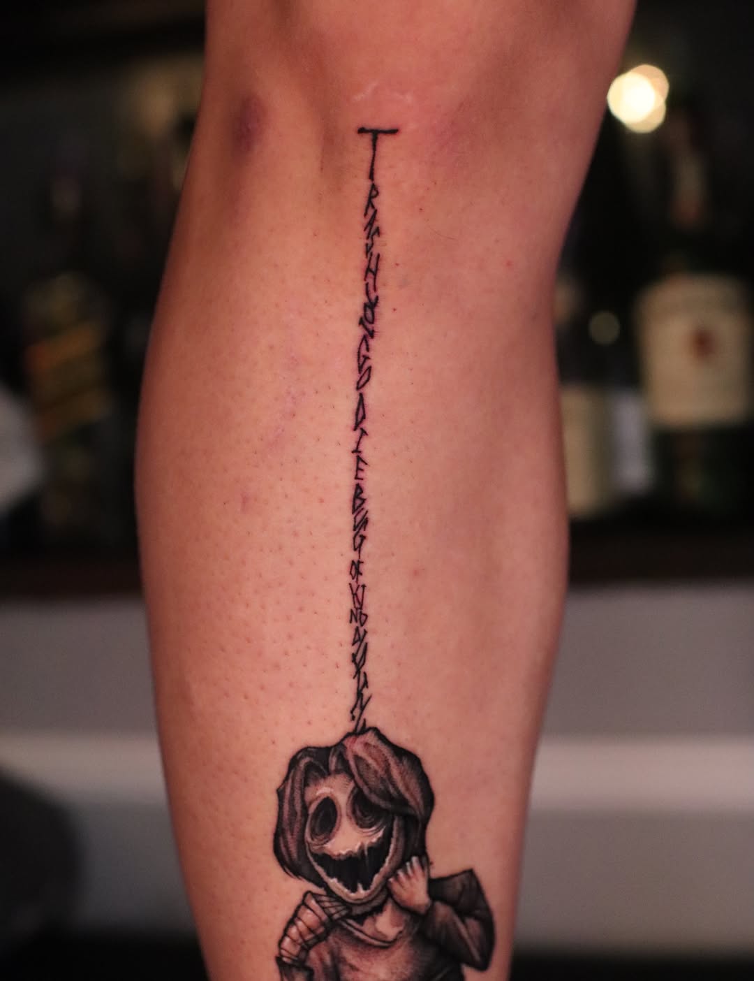 Tattoo by @tattooist_twoface — lettering_script, dark_realism